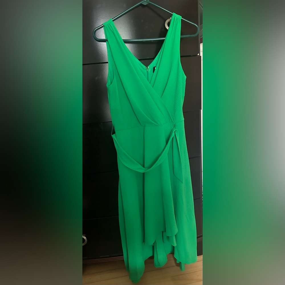 Brand new chiffon-style faux wrap dress. Never worn!